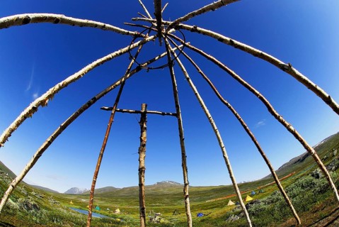 Scaffolding of a Sami tent, behind Akka massif in Stora Sjöfallet N.P, Lapland, Sweden
