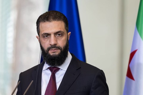 Ahmed al-Sharaa (President of the Syrian Arab Republic) at a joint press conference with Friedrich