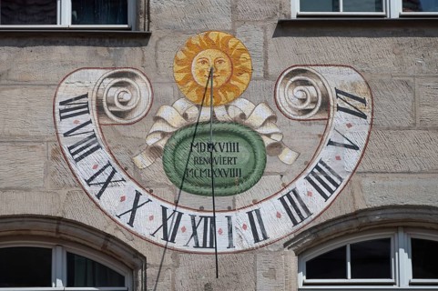 Historic sundial from 1519. on a residential building, Innere Laufer Gasse, Nuremberg, Middle