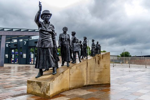 Bronze sculpture group by Andrew Brown depicting Mary Barbour leading rent strike protesters
