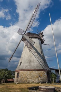 Historic windmill with mill wheel in Lechtingen, Wallenhorst, Lower Saxony, Germany