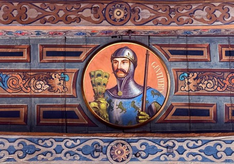 The wooden ceiling of the Upper Town Hall is painted with medallions of German emperors and kings,