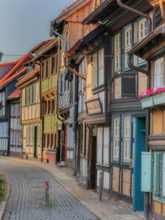 With historic half-timbered houses in Wernigerode Harz Germany