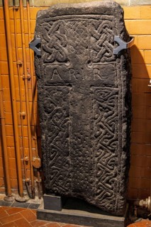 Early medieval carved cross slab decorated with Celtic interlace, part of the early medieval Govan