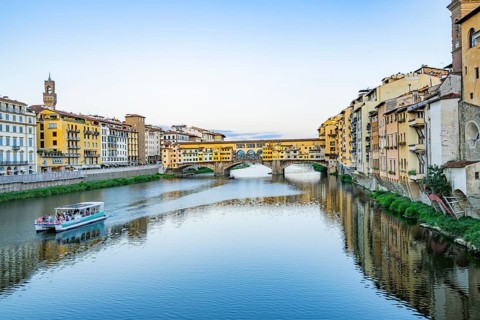 Ponte Vecchio bridge over Arno River at sunset, Florence, Tuscany, Italy