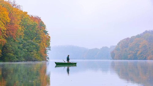 Anglers on the autumnal Schmale Luzin, lake in Mecklenburg-Western Pomerania, Feldberg Lake