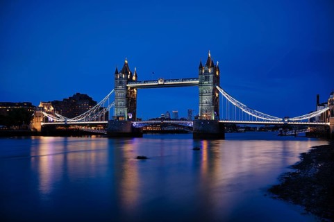Night view, Thames, Tower Bridge, illuminated, behind Canary Wharf, blue hour, dusk, London,