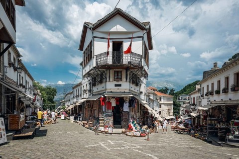 GJIROKASTER, ALBANIA - JULY 30, 2026: Traditional Albanian street in Gjirokastër with white