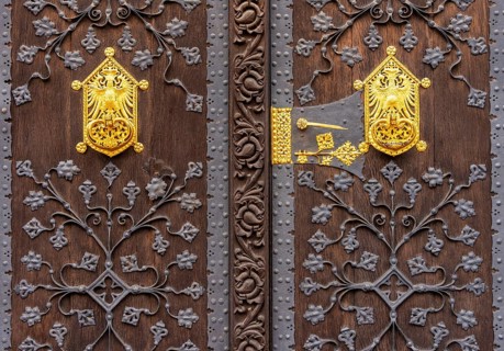 Detailed photo, gilded ornaments at the gates to the entrance of the Old Town Hall in Frankfurt am