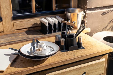 Dirty dishes on a table after client in restaurant. An inviting outdoor cafe, wide variety of