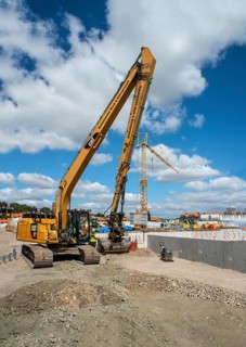 Construction site with excavator in Ystad, Skåne County, Sweden, Scandinavia