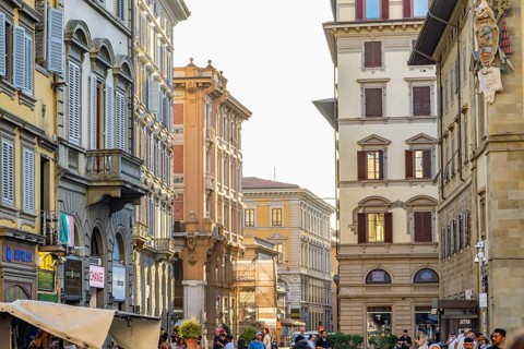 Piazza de' Pitti Street going through the city at sunset, Florence, Tuscany, Italy
