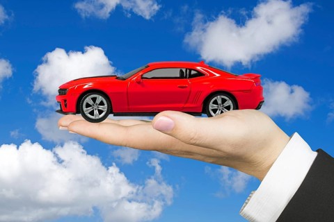Symbolic photo, Red Chevrolet, Camaro, ZL1, USA, in the hand of a woman, studio, Lower Saxony,