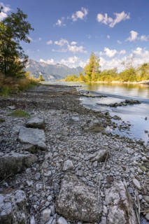 River, riverbed, trees, mountains, gravel, sunny, low tide, drought, August 2026, climate change,
