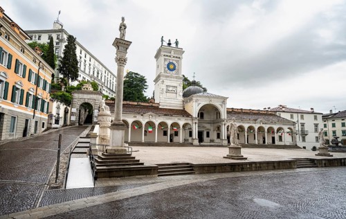Piazza della Libertà main square with Loggia e Tempietto di San Giovanni and clock tower, Castello