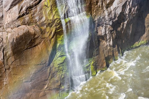 Rainbow on tips at the Orange River waterfall, Augrabies Falls National Park, North Cape, South