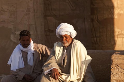 Middle East, Egypt, Egyptians, two Arabs, sitting, temple, Kom Ombo