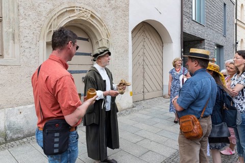 City tour with Philipp Melanchthon in historical costume in the old town, here in front of the