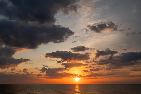 Sunset and cloudy, dramatic evening sky, Houvig Beach, North Sea, Denmark