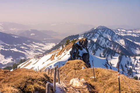 Snow-capped mountain peaks with wide views and blue skies, Hochgrat Mountains, Allgäu, Bavaria,