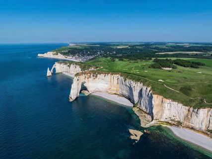 Aerial view of the rock gate La Manneporte rock gate behind the Porte d'Aval rock formation,