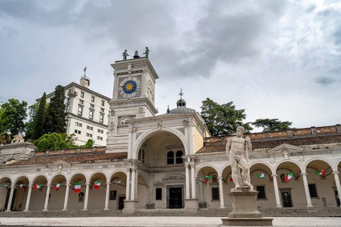 Piazza della Libertà main square with Loggia e Tempietto di San Giovanni and clock tower, Castello