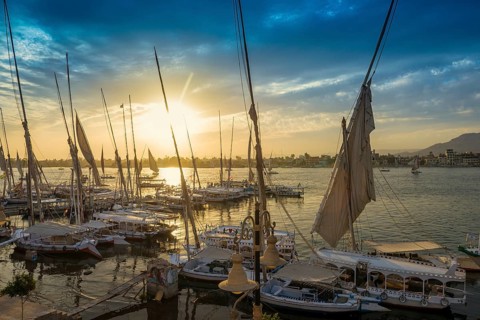 Sailing ships, feluks on the Nile, sunset, Luxor, Egypt