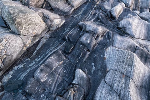 Rock structures on the coast, Söröya, Finnmark, Norway, February 2019