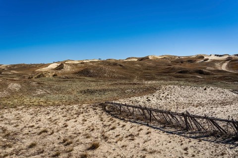 The Gray Dunes, or the Dead Dunes is sandy hills with a bit of green specks at the Lithuanian side