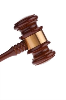 A judge's hammer or auction hammer. Isolated against white background