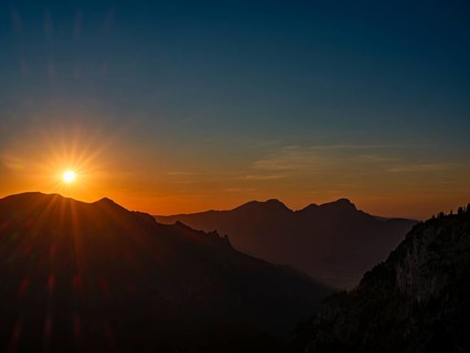 Sunset in the mountains during a partial solar eclipse, Bischofswiesen, Berchtesgadener Land,