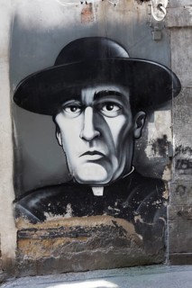 Mural of the Neapolitan comedian Totò in his role as Monsignor in the 1962 film Totò Diabolicus,