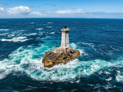 Aerial view of the historic Phare de la Vieille lighthouse, built from 1882 to 1887 on a rocky reef