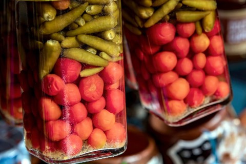 Jars of peppers typical of Northeastern Brazil displayed at a popular market in Sao Luis, Maranhao,