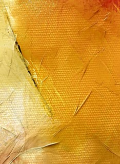 A professional abstract oil painting fragment dominated by warm golden and ochre tones, featuring