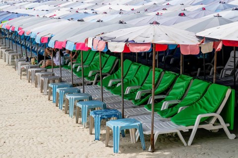 Sun loungers and umbrellas, Koh Larn, Thailand