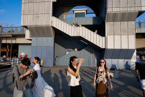 Istanbul, Turkey. August 8th 2026. Tourists gather on the Galata Bridge at sunset to make