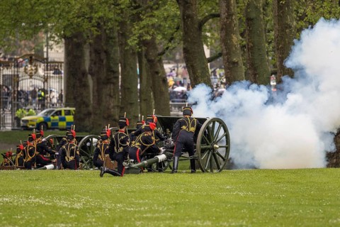 Gunners of the King's Troop Royal Horse Artillery fire a 13-pounder field gun during the Green Park