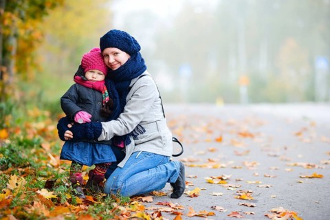 Mother and daughter walking in the forest, autumn, autumn forest, fog, Finland, Scandinavia