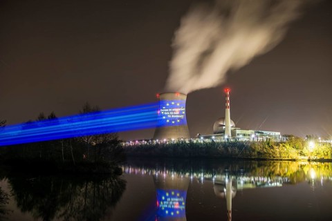 Protest action broadcast by the anti-nuclear organization, projection, night view, 05-03-2026,