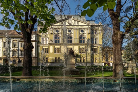 Fountain in Astra City Park and the Astra Library in Sibiu or Sibiu, Transylvania, Romania