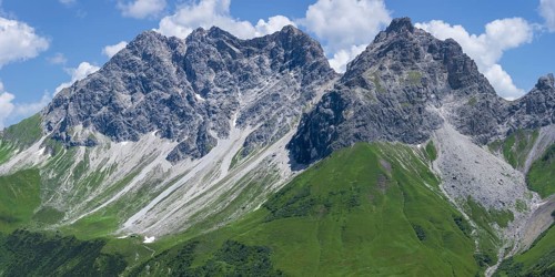 A sweeping mountain panorama from the Älpelesattel at 1, 780 m, stretching towards the striking