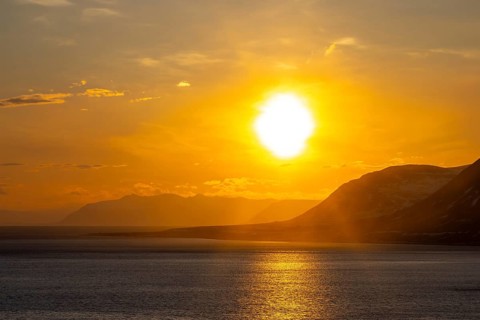 Isfjorden, Isfjord showing midnight sun at sunset in spring, Spitsbergen, Svalbard, Norway
