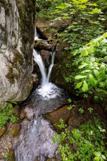 Small waterfall, Mühldorfer Bach flows through the Barbarossa Gorge, long exposure, Mölltal,