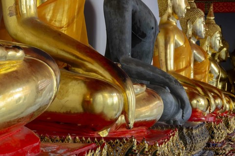 Gold-plated Buddha statues (Bhumispara-mudra: Gautama Buddha at the moment of enlightenment), Wat