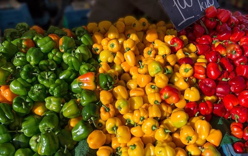 Peppers (Capsicum) – green, yellow and red – at a market stall in Enschede, the Netherlands