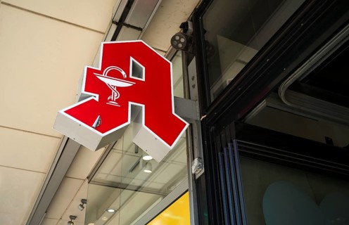 Logo, red neon sign, pharmacy sign with Aesculapian stick, Aesculapian stick, Stuttgart,
