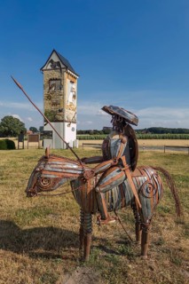 Don Quixote at the historic windmill in Lechtingen, Wallenhorst, Lower Saxony, Germany