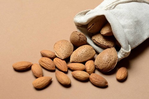 Almond, almond kernels and unopened stone kernels