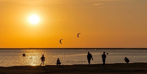 Sunset, people, silhouettes, kite surfers, main beach, Borzburg, East Frisia, Lower Saxony, Germany